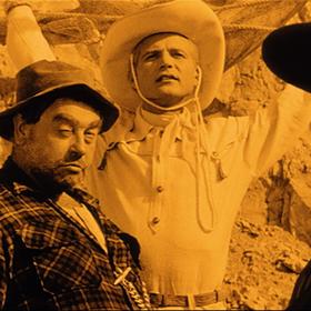 Limonádový Joe aneb Koňská opera je hudební komedie, parodie na western, z roku 1964. Hlinomaz si tu zahrál jednoho ze tří hlavních padouchů.