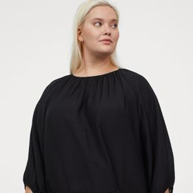  Šaty s balonovým rukávem, 599 Kč.