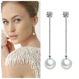 Tento druh náušnic se skvěle hodí pro obličej ve tvaru srdce, který správně vyváží.