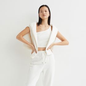 Bílé volnočasové tepláky z pevného žerzeje z bavlněné směsi. H&M, 249 Kč