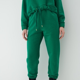 Zelené teplákové kalhoty. MOHITO, 299 Kč 