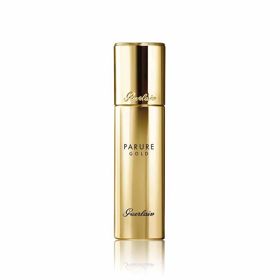 Rozjasňující fluidní make-up Guerlain Parure Gold Radiance Foundation s SPF 30 v odstínu Pale Beige. Cena 2 390 Kč