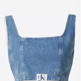 Korzetový živůtek nachází uplatnění v nejnovějších stylových kombinacích od základů postavených na džínovině. (Calvin Klein,1 999 Kč)