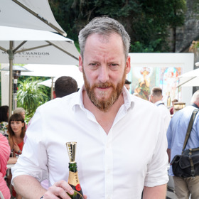 Výkonný ředitel Mezinárodního filmového festivalu Karlovy Vary Kryštof Mucha a jeho pestrobarevný plnovous.