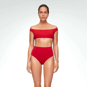 Jednoduché tvary, výrazné barvy, minimalistické pojetí. Plavky Oysho se sníženou linií ramen. (799 Kč za horní díl)