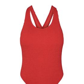 Jednoduchý tvar, módní žabičkovaný materiál. (Pieces, 1 099 Kč)