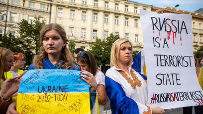 FOTO: "Rusko je teroristický stát," hlásá transparent.