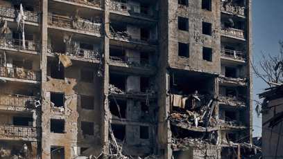 FOTO: Rozstřílený dům.