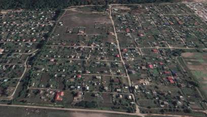 FOTO: Vesnice Moschun vzdálená přibližně 3 kilometry od Kyjeva na záběru před válkou.