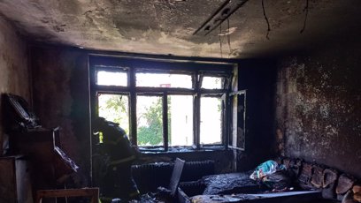 FOTO: V Brně hořel byt v ubytovně.