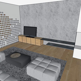 Návrh obýváku, vpravo si dobře povšimněte stěny, kde rodina skladuje dřevo do krbu a zároveň slouží jako knihovna.