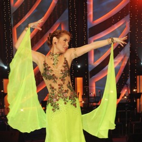 Slovenská herečka Zuzana Norisová tancovala ve StarDance v roce 2008. Její neonové, žlutozelené šaty jí štěstí přinesly.