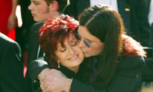 Ozzy Osbourne se svou manželkou.