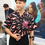 Milan Peroutka pro tentokrát zvolil outfit od luxusní značky Prada. 