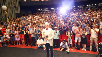 FOTO: Michael Douglas se zaplněným sálem.