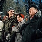 Jaroslav Marvan se, jakožto revizor Gustav Anděl, vydává na dovolenou do zasněžených Vysokých Tater. Na snímku Josef Kemr, Stella Zázvorková a Jaroslav Marvan.