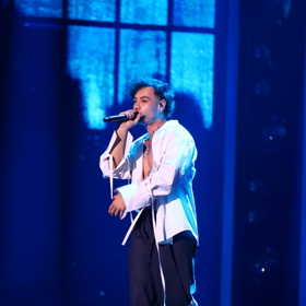 Renne Dang na pódiu.