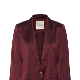 Najdete ale i levnější alternativy, a to jak v odlišných materiálových provedeních, tak jiných nápadných a trendy odstínech, které budou fungovat jako dobrá alternativa. Třeba jako tento saténový blejzr v trendy vínové, který seženete u značky Cream za 2860 Kč.