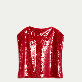 Pod průhlednou vrstvou se bude krásně vyjímat lesklá halenka. Flitry budou pořád vidět, ale jejich lesk bude decentně tlumený. Tento top má v nabídce Marks&Spencer za 999 Kč