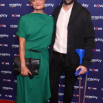 Václav Neužil s manželkou Lenkou, která zazářila v zelené róbě doplněné o černé psaníčko.