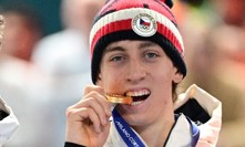 Metoděj Jílek s medailí. 